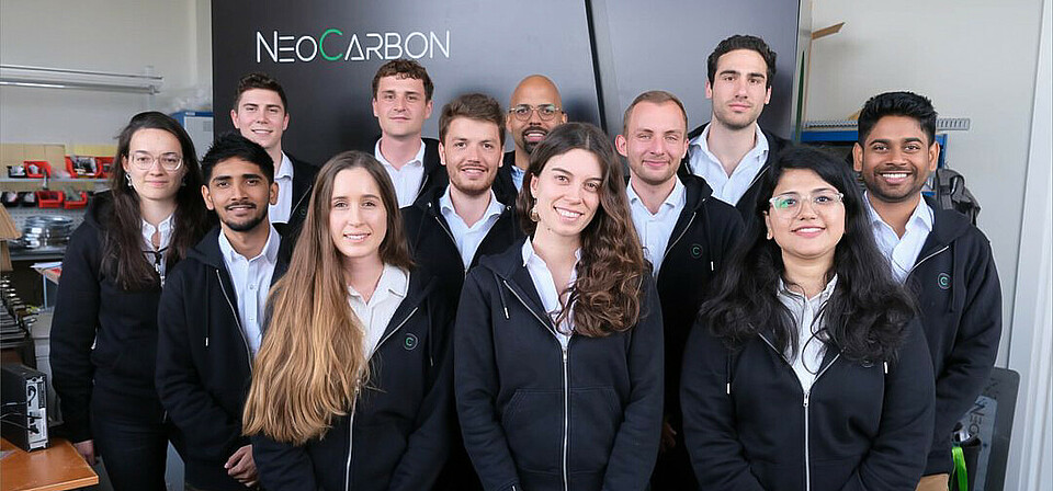 The team of 10+ people at NeoCarbon, including founders René Haas and Silvain Toromanoff in the back.