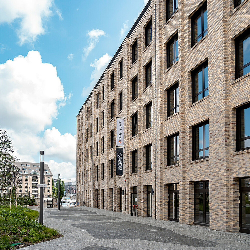 A modern brick building in Berlin is home to Solaris Group